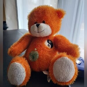 Fiesta 8" Sitting Bear W/Ying Yang Emb. And Jade Pendant